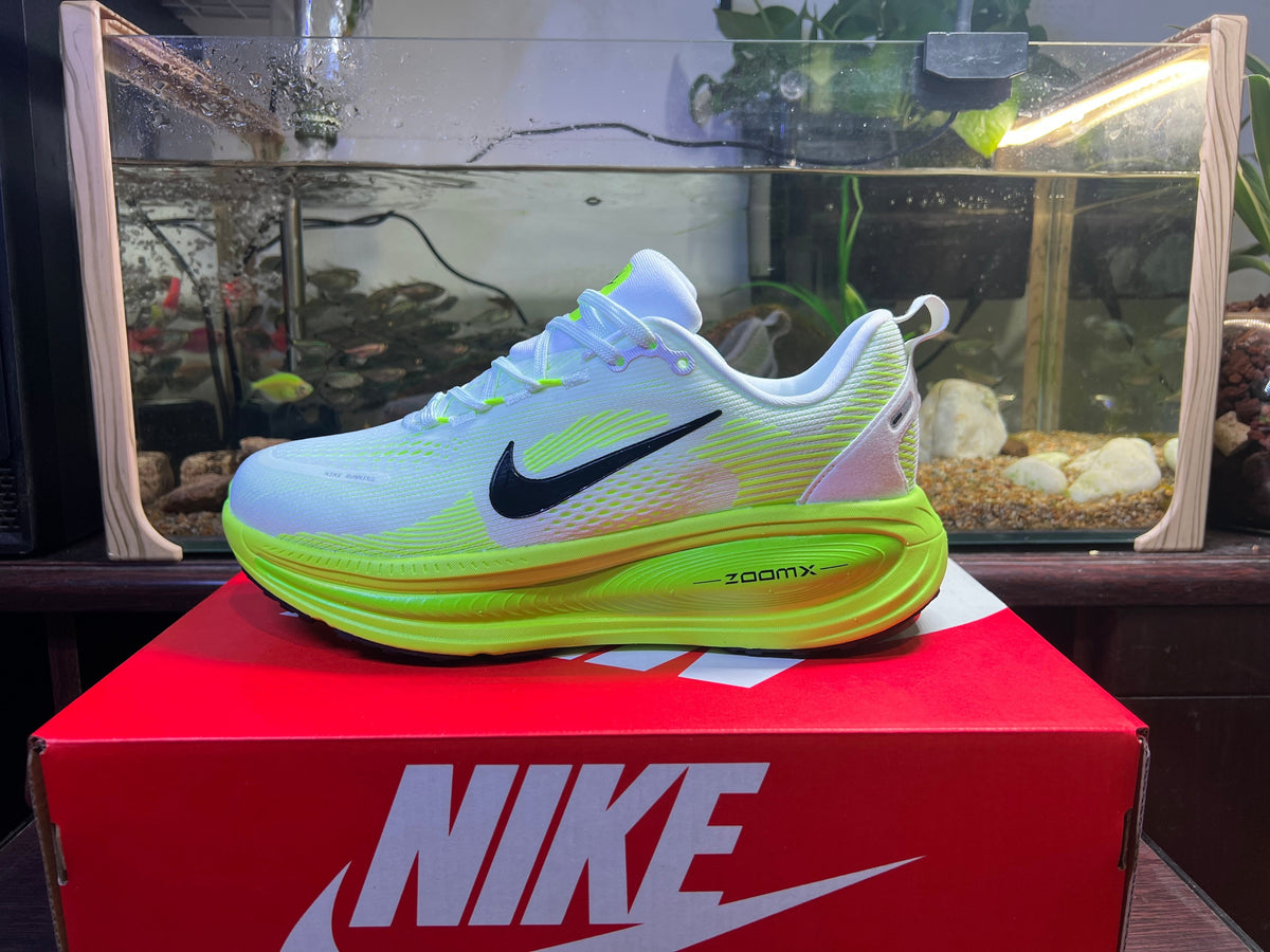 Nike Vomero 18 Running Shoes in Blue and Volt Green
