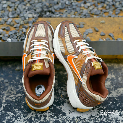 Nike Air Zoom Vomero 5 Sneakers in Brown and Orange