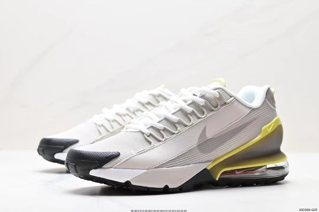 Nike Air Max 95 Sneakers in White and Volt