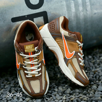 Nike Air Zoom Vomero 5 Sneakers in Brown and Orange