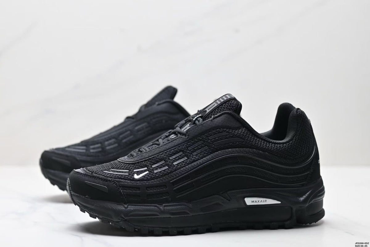 Nike Air Max Plus x Comme des Garçons Black Sneakers