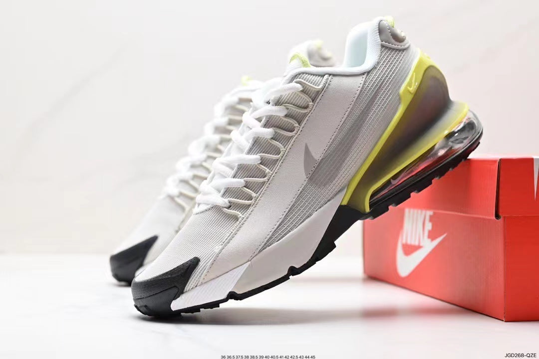 Nike Air Max 95 Sneakers in White and Volt
