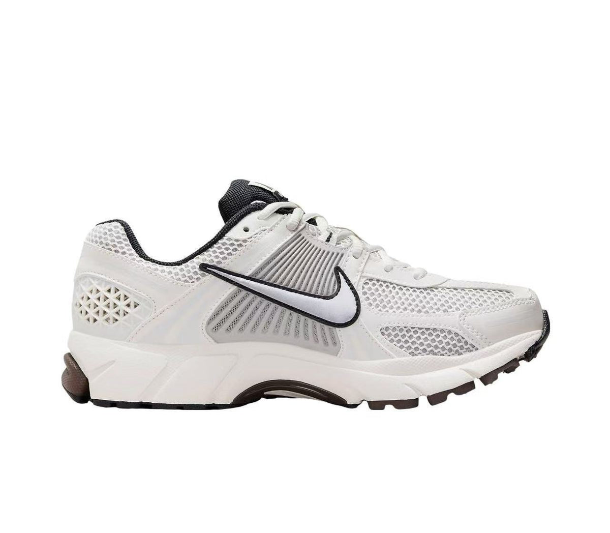 Nike Vomero 5 Sneakers in Metallic Silver and White