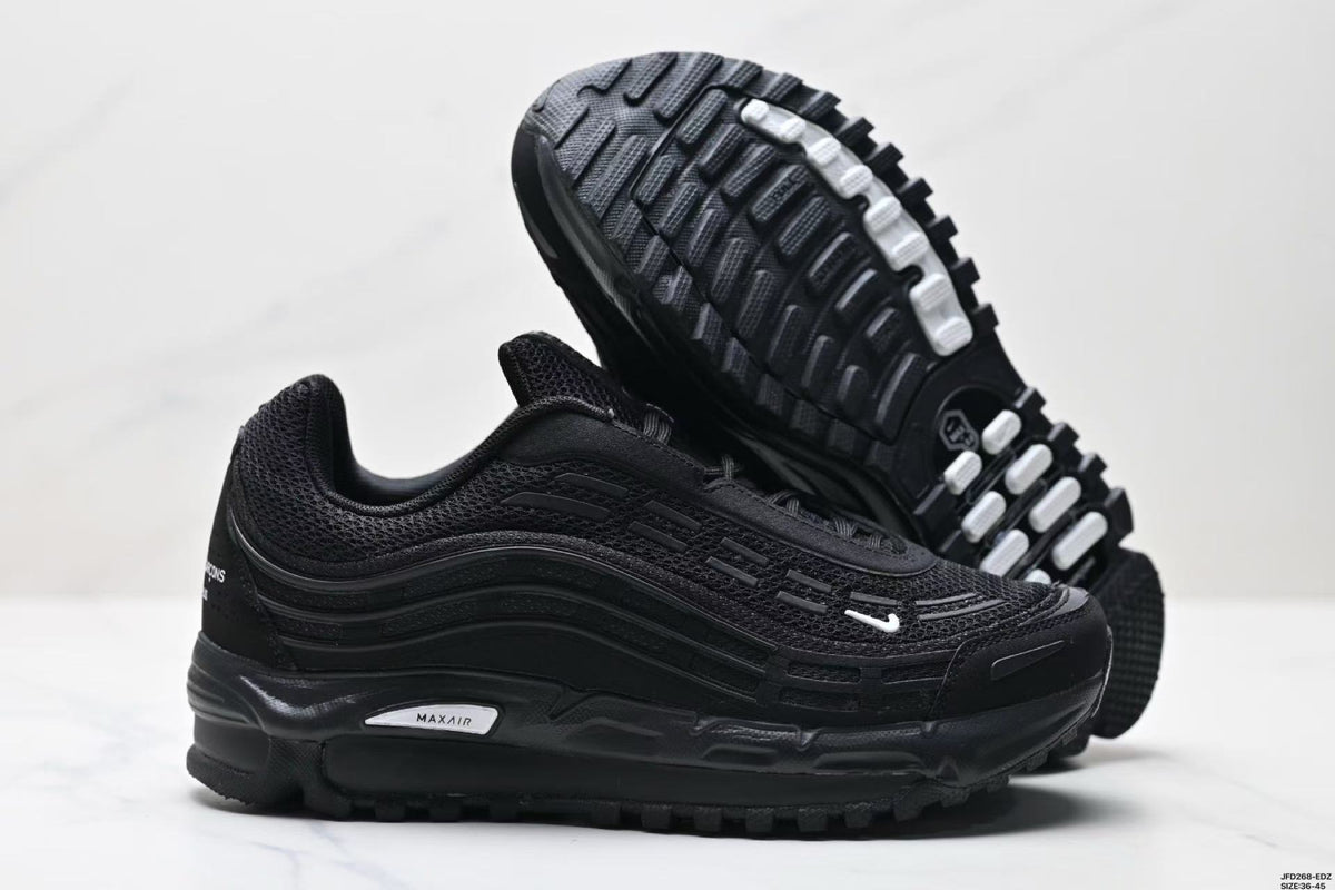 Nike Air Max Plus x Comme des Garçons Black Sneakers