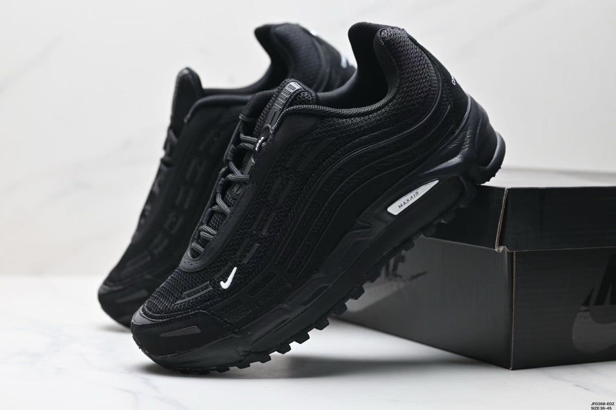 Nike Air Max Plus x Comme des Garçons Black Sneakers