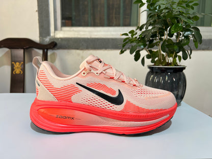 Nike Vomero 18 Running Shoes in Cream and Coral