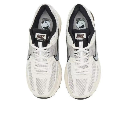 Nike Vomero 5 Sneakers in Metallic Silver and White