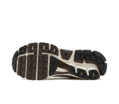 Nike Vomero 5 Sneakers in Metallic Silver and White
