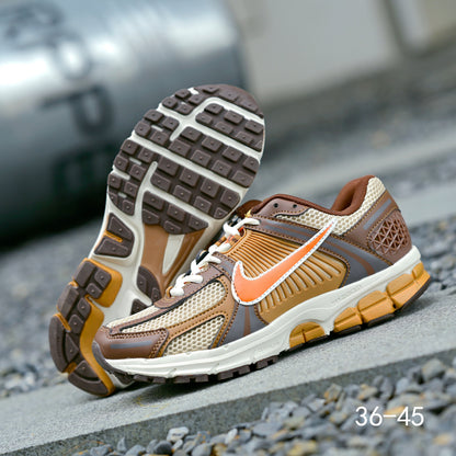 Nike Air Zoom Vomero 5 Sneakers in Brown and Orange