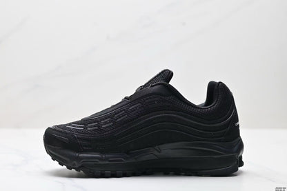 Nike Air Max Plus x Comme des Garçons Black Sneakers